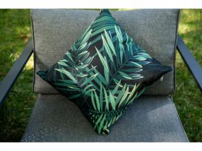 Small green pillow with leaf motifs